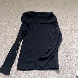 Black ribbed sweater with pearl detail on sleeves